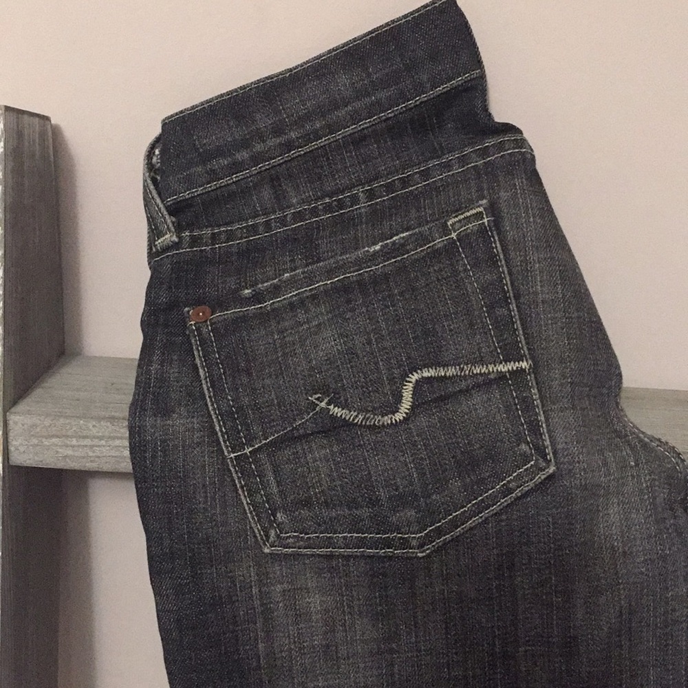 Boot cut black washed 7 For All Mankind Jeans.